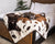 French Bulldog on Brown Faux Cowhide Blanket on Human Bed