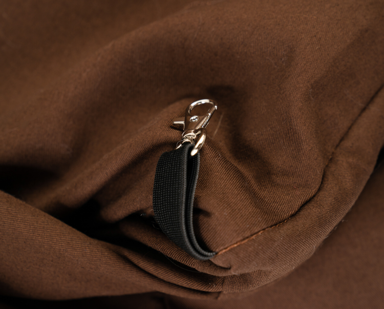 hook on brown bolster dog bed cover