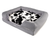 black faux cowhide topper on bolster bed