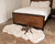 White faux fur queen size bed runner that doubles as a pet bed 