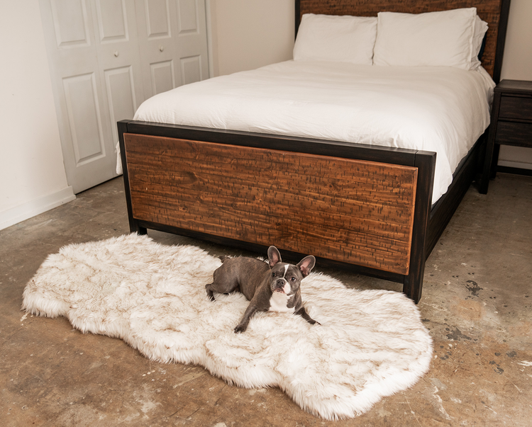 White faux fur queen size bed runner that doubles as a pet bed 