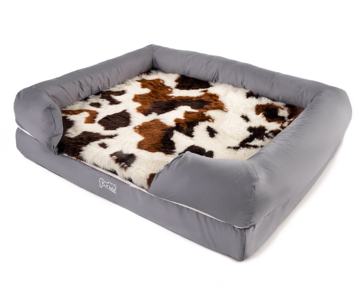 Brown Faux Cowhide Topper on Bolster bed