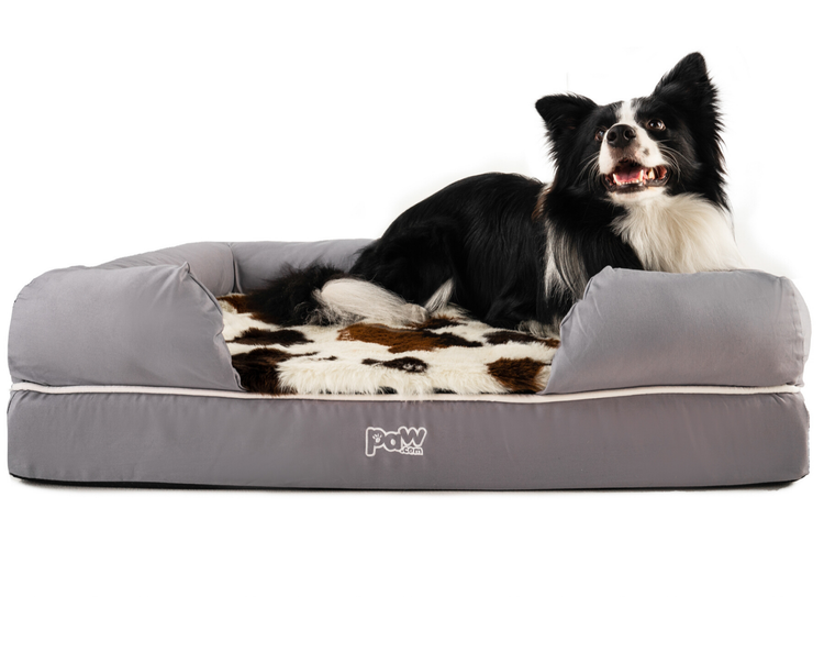 Brown Cowhide Topper on Bolster Bed