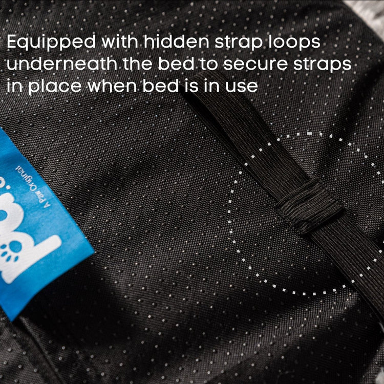 Equipped with hidden strap loops underneath the bed to secure straps in place when bed is in use