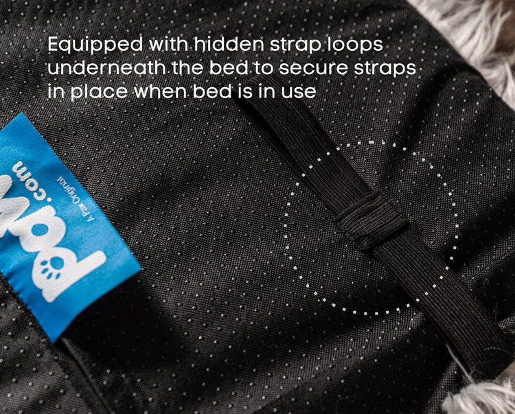 Equipped with hidden strap loops underneath the bed to secure straps in place when bed is in use